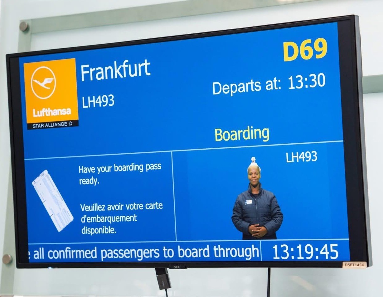 International Sign translation of pre-recorded announcement displayed at Toronto Airport